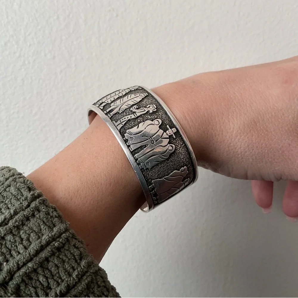 Silver Cuff Bracelet with Engraved Figures - Picture 1 of 6